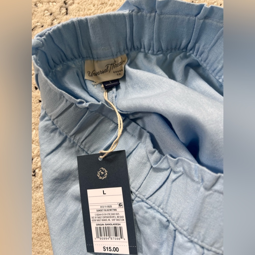 Powder blue shorts size large.